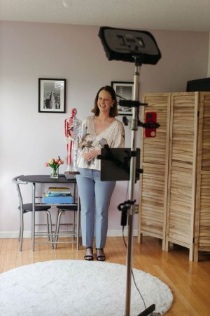 Amber leading a live online Meridian Qigong self-care class at Harmony Healing